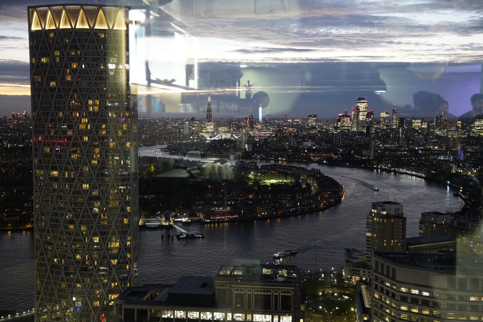 The London skyline and river at dusk, seen from the event venue
